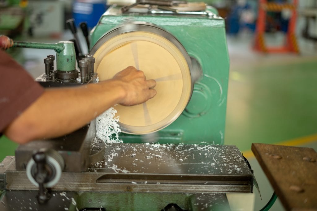 lathe machining a plastic blank